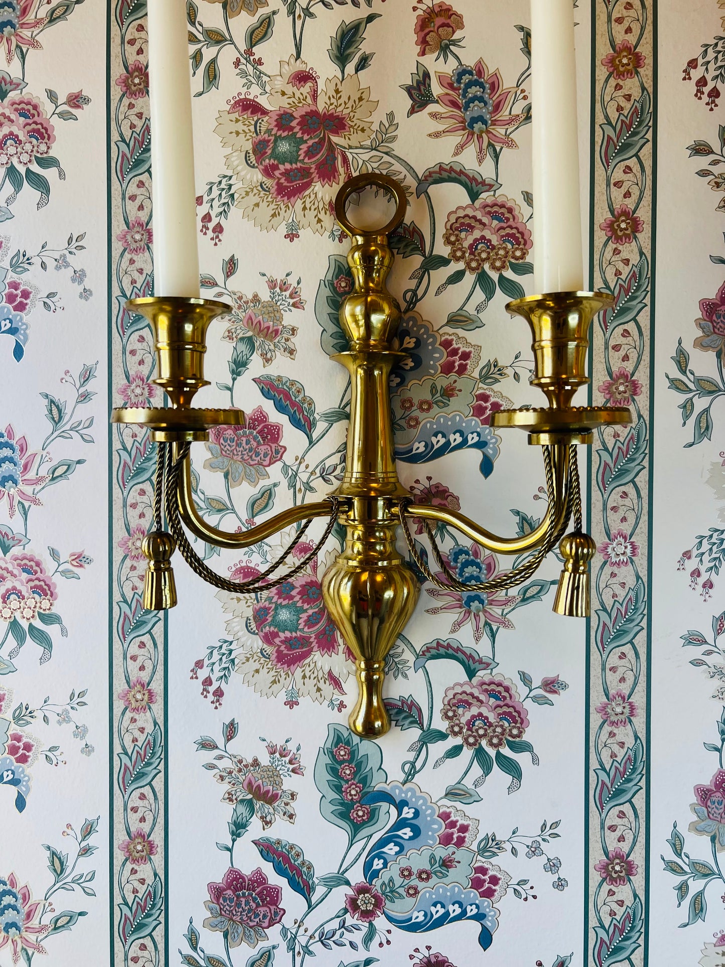 Pair of double arm brass braid and tassel candelabra wall sconces
